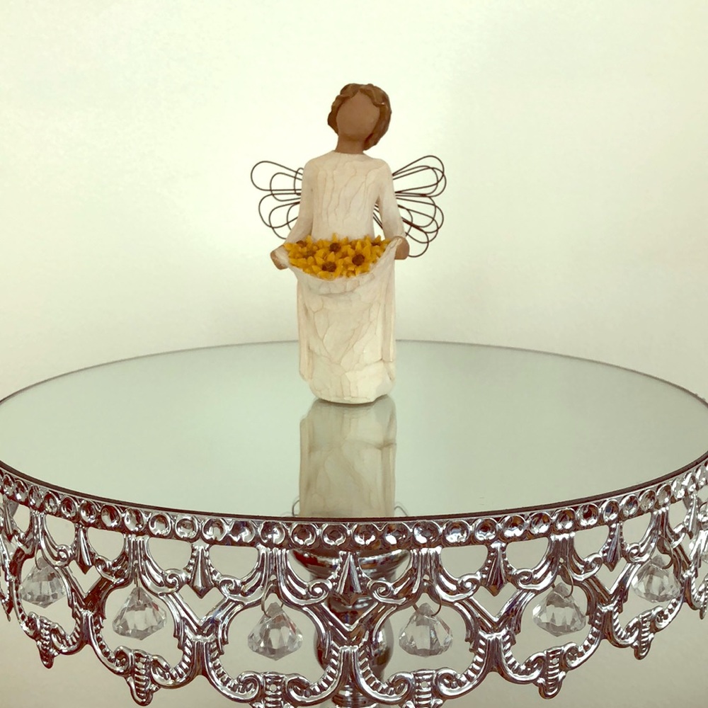 Willow Tree - Sunshine. Girl holding sunflowers.